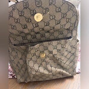 Brown monogrammed backpack